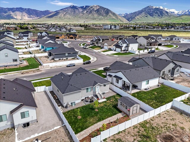 1245 N Clemente Way, Tooele, UT 84074 - aerial view of residential area featuring a mountainous background