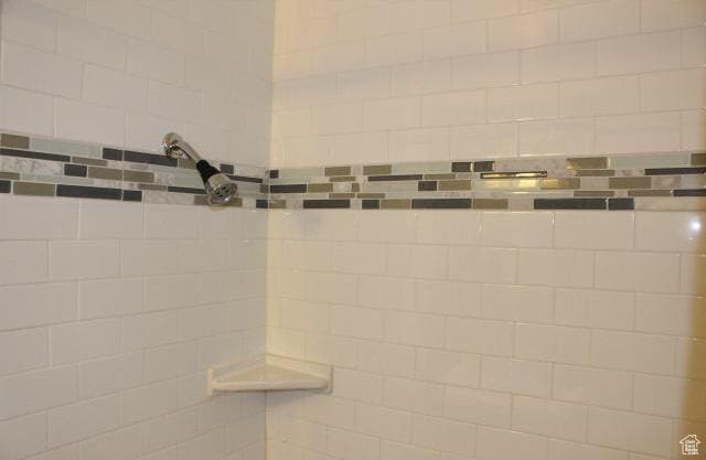 bathroom view of tiled shower