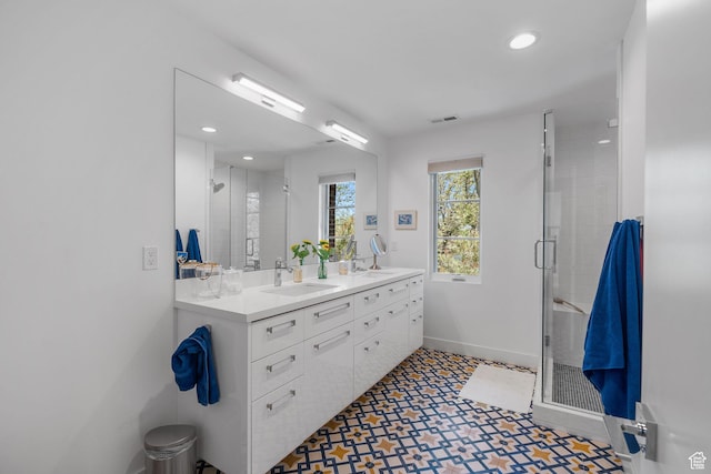 1863 E Hubbard Ave, Salt Lake City, UT 84108 - bathroom featuring a shower stall, baseboards, double vanity, recessed lighting, and tile patterned floors