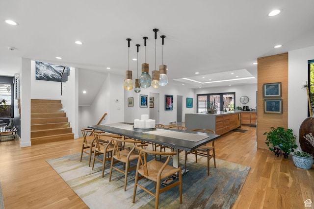 1863 E Hubbard Ave, Salt Lake City, UT 84108 - dining space featuring light wood-type flooring, stairs, recessed lighting, and healthy amount of natural light