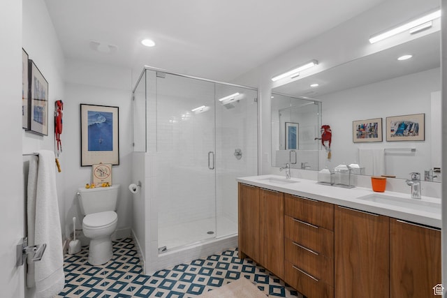 1863 E Hubbard Ave, Salt Lake City, UT 84108 - full bath featuring toilet, a shower stall, double vanity, and recessed lighting