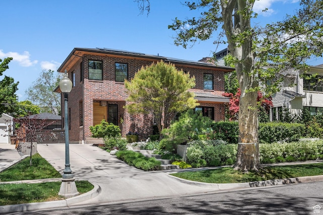 1863 E Hubbard Ave, Salt Lake City, UT 84108 - view of front of property with brick siding and roof mounted solar panels
