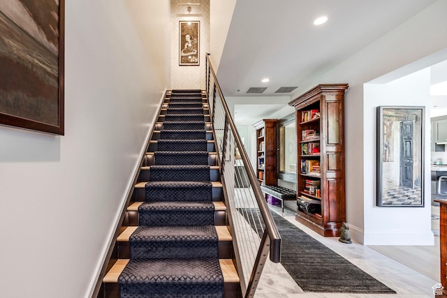 268 S State St E Unit 417, Salt Lake City, UT 84111 - staircase with recessed lighting and baseboards