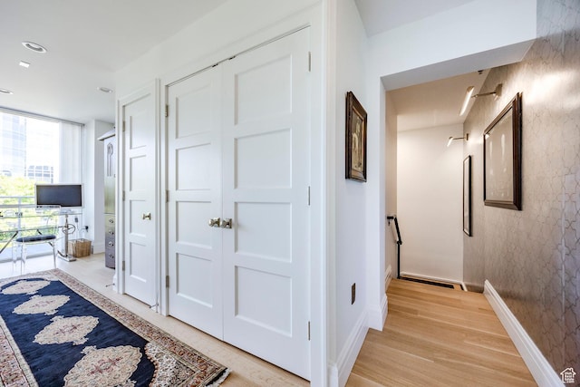 268 S State St E Unit 417, Salt Lake City, UT 84111 - hall with light wood-type flooring and baseboards