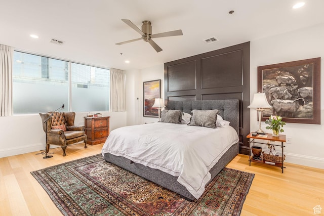 268 S State St E Unit 417, Salt Lake City, UT 84111 - bedroom with light wood-style floors, baseboards, recessed lighting, and ceiling fan