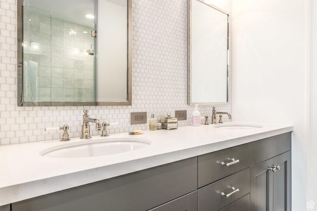 268 S State St E Unit 417, Salt Lake City, UT 84111 - full bath featuring double vanity, a tile shower, and decorative backsplash
