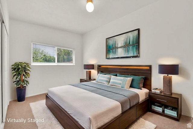 bedroom with light carpet