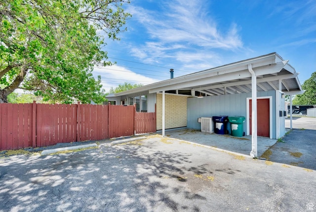 uncovered parking lot with fence