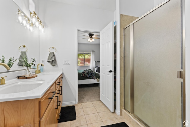 full bath featuring ensuite bath, a shower stall, tile patterned flooring, a ceiling fan, and double vanity