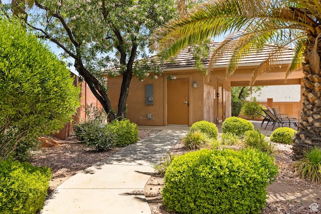 view of community featuring fence and a patio area