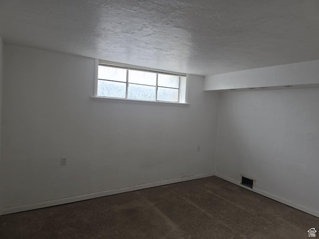 443 N 450 E, Orem, UT 84097 - below grade area featuring a textured ceiling, carpet, and baseboards
