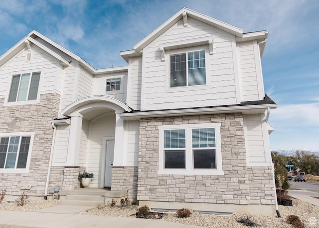 view of front facade featuring stone siding