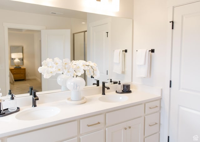 full bath featuring double vanity