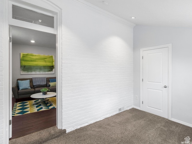 1318 E 300 S, Salt Lake City, UT 84102 - carpeted spare room featuring ornamental molding, baseboards, brick wall, lofted ceiling, and recessed lighting