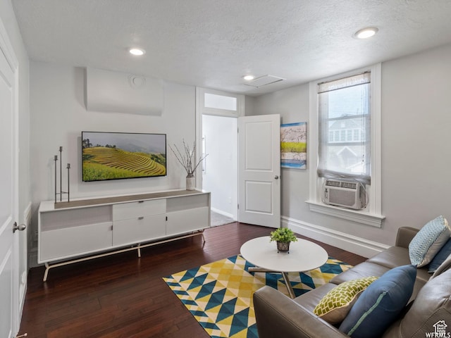 1318 E 300 S, Salt Lake City, UT 84102 - living room featuring cooling unit, hardwood / wood-style flooring, a textured ceiling, baseboards, and recessed lighting