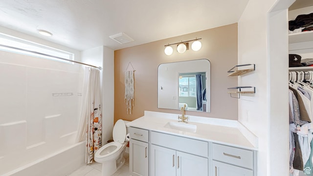376 S 1080 W Unit 301, American Fork, UT 84003 - bathroom with vanity, tile patterned floors, toilet, shower / bath combination with curtain, and a spacious closet