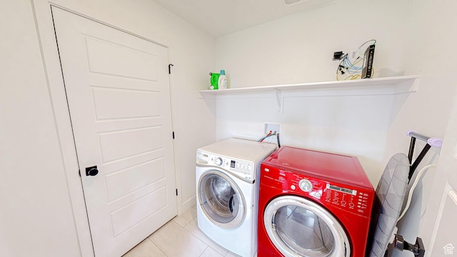 376 S 1080 W Unit 301, American Fork, UT 84003 - laundry area with washer and dryer and light tile patterned flooring
