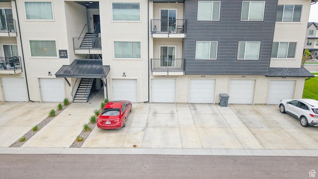 376 S 1080 W Unit 301, American Fork, UT 84003 - view of front of house with stucco siding and an attached garage