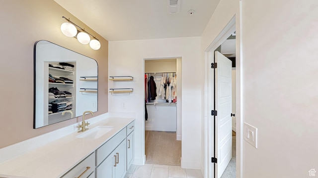 376 S 1080 W Unit 301, American Fork, UT 84003 - full bath featuring vanity, a walk in closet, tile patterned flooring, and baseboards