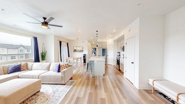 376 S 1080 W Unit 301, American Fork, UT 84003 - living area featuring light wood-type flooring and ceiling fan
