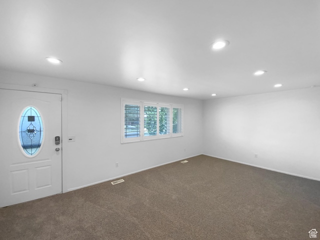 2987 S Eucalyptus Way, West Valley City, UT 84119 - entrance foyer with recessed lighting, dark colored carpet, and baseboards