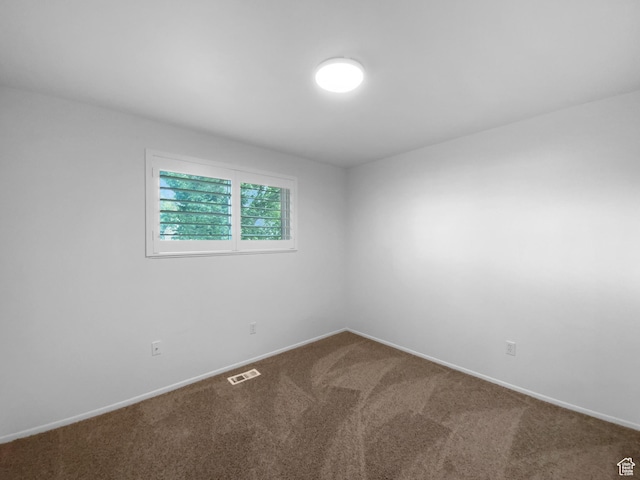 2987 S Eucalyptus Way, West Valley City, UT 84119 - spare room with carpet floors and baseboards