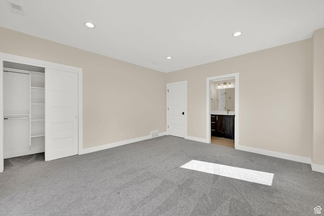 4491 N Seven Bridges Rd, Eden, UT 84310 - unfurnished bedroom with carpet flooring, recessed lighting, baseboards, ensuite bath, and a closet