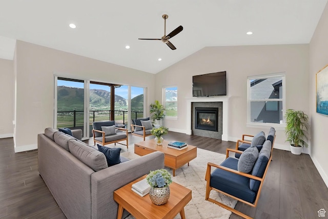 4491 N Seven Bridges Rd, Eden, UT 84310 - living area with a ceiling fan, wood finished floors, lofted ceiling, a glass covered fireplace, and recessed lighting