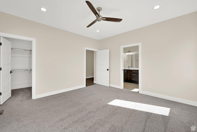 4491 N Seven Bridges Rd, Eden, UT 84310 - unfurnished bedroom featuring carpet floors, a spacious closet, baseboards, recessed lighting, and a closet