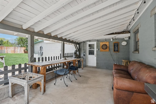 view of patio / terrace featuring an outdoor hangout area, fence, and outdoor dining space