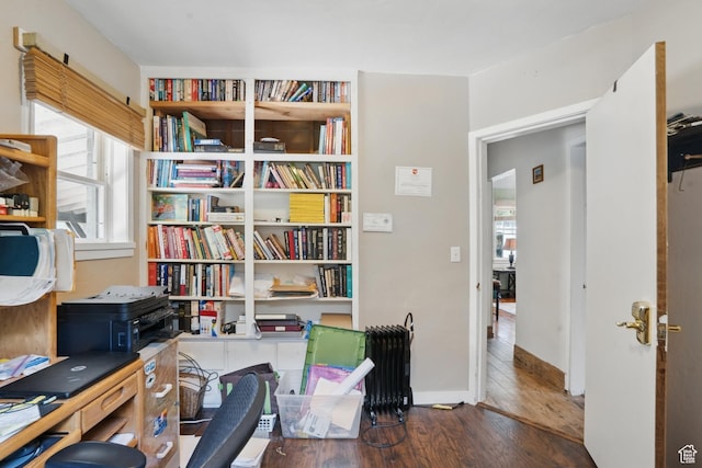 office featuring wood finished floors and baseboards