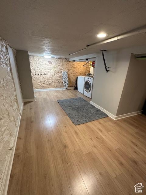 125 W 800 S, Salt Lake City, UT 84101 - finished below grade area featuring wood finished floors, washing machine and dryer, and baseboards