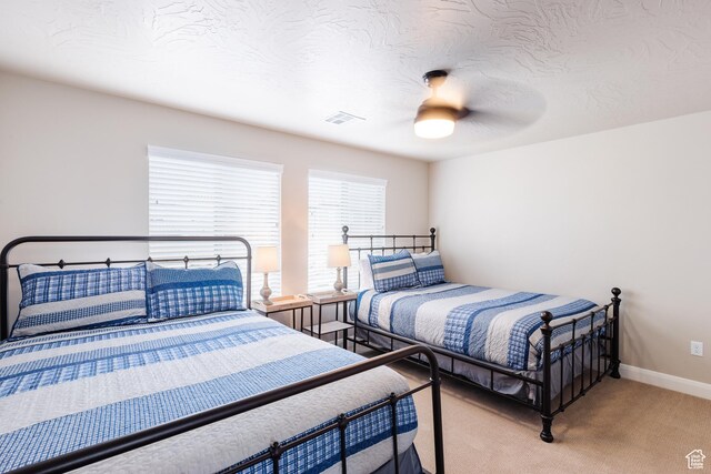 273 N Puerta Dr W, Washington, UT 84780 - carpeted bedroom with baseboards and a ceiling fan