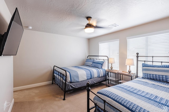 273 N Puerta Dr W, Washington, UT 84780 - bedroom featuring carpet, baseboards, ceiling fan, and a textured ceiling
