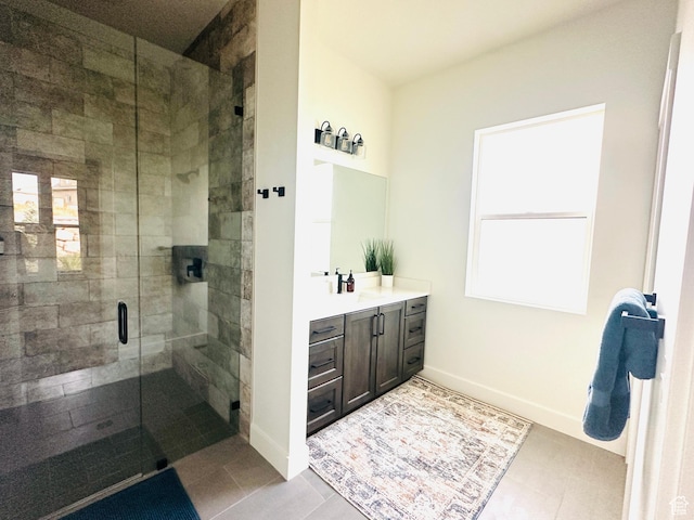 39 W Tamarind Way, Garden City, UT 84028 - bathroom with a stall shower, vanity, and baseboards