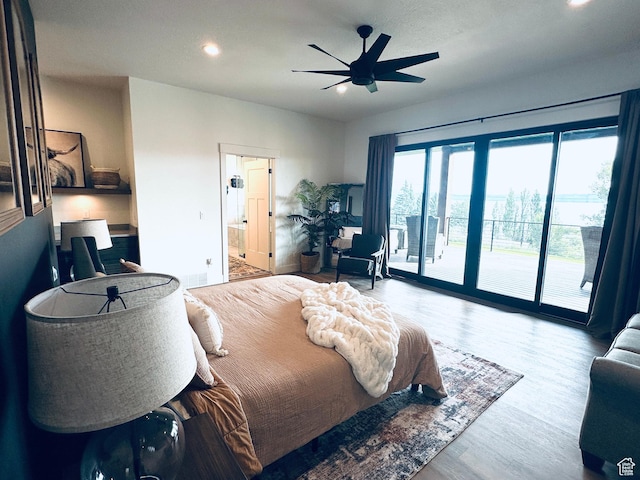 39 W Tamarind Way, Garden City, UT 84028 - bedroom with access to exterior, recessed lighting, wood finished floors, connected bathroom, and ceiling fan