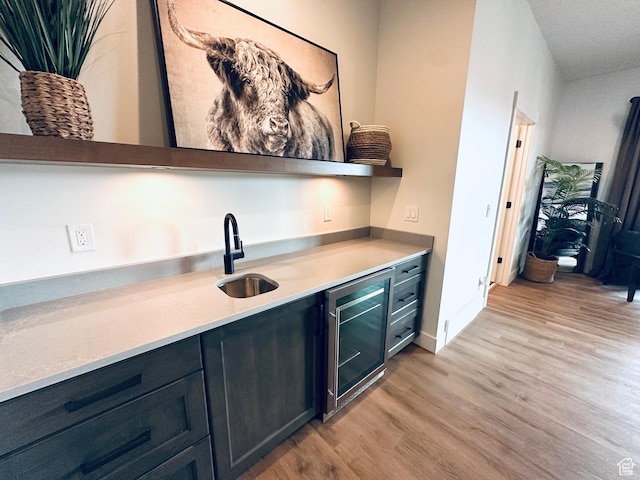 39 W Tamarind Way, Garden City, UT 84028 - indoor bar featuring wine cooler, light wood-style floors, and baseboards