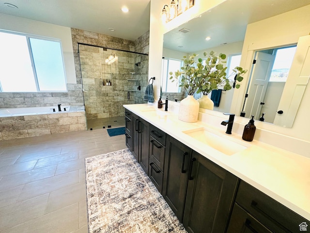39 W Tamarind Way, Garden City, UT 84028 - full bath with a bath, a shower stall, tile patterned floors, and double vanity