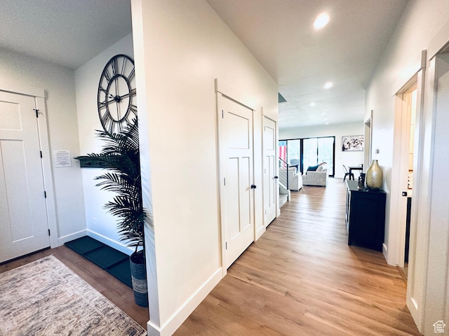 39 W Tamarind Way, Garden City, UT 84028 - foyer entrance featuring light wood finished floors, recessed lighting, and baseboards