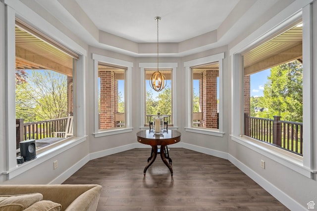8 Snow Forest Cv, Sandy, UT 84092 - sunroom / solarium featuring healthy amount of natural light, a chandelier, wood finished floors, and baseboards