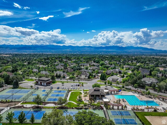 8 Snow Forest Cv, Sandy, UT 84092 - drone / aerial view of a mountain backdrop and a pool area