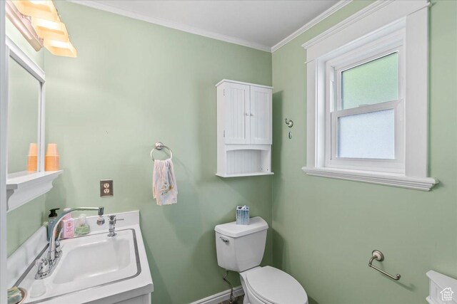 561 E 2780 N, Provo, UT 84604 - half bath featuring a sink, toilet, ornamental molding, and baseboards