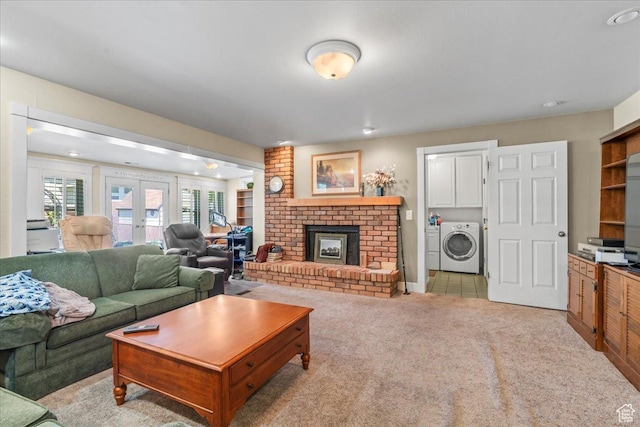 561 E 2780 N, Provo, UT 84604 - carpeted living room featuring washing machine and clothes dryer and a brick fireplace