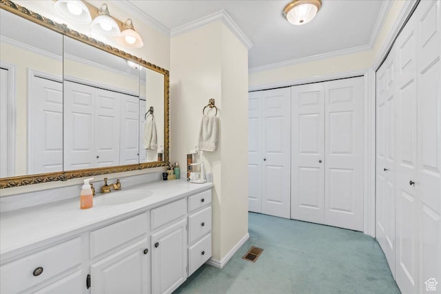 561 E 2780 N, Provo, UT 84604 - bathroom featuring a closet, ornamental molding, vanity, and baseboards
