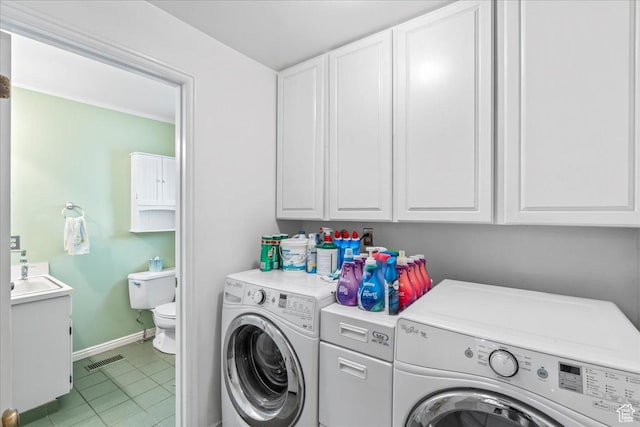 561 E 2780 N, Provo, UT 84604 - laundry area featuring separate washer and dryer, baseboards, and light tile patterned flooring