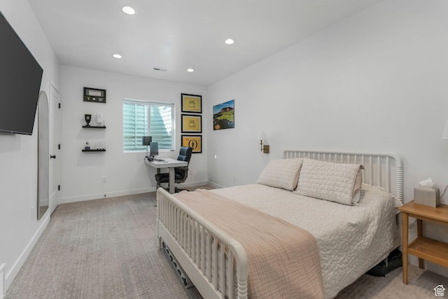 bedroom featuring baseboards, recessed lighting, light colored carpet, and an office area