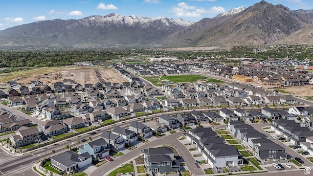 aerial overview of property's location featuring nearby suburban area and mountains