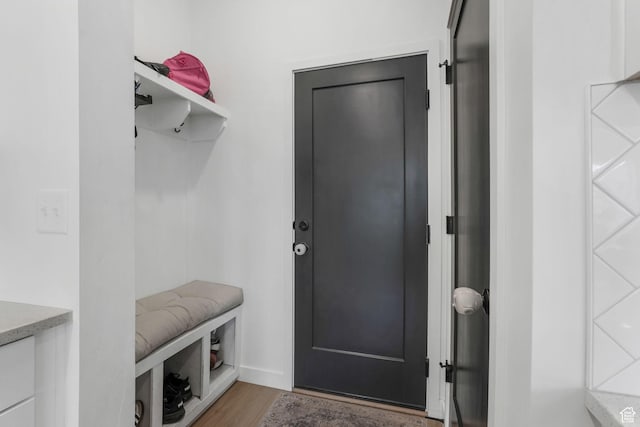 mudroom with wood finished floors