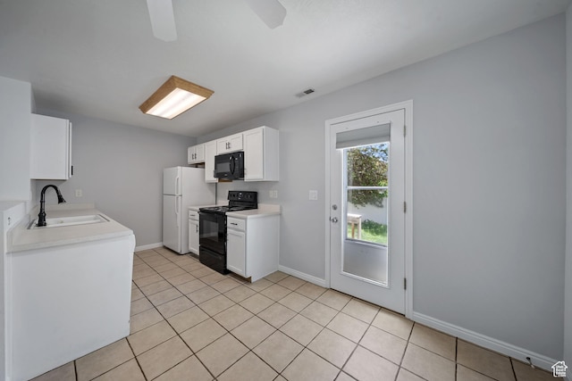 1957 N 2225 W, Clinton, UT 84015 - kitchen featuring black appliances, a sink, light countertops, white cabinetry, and baseboards