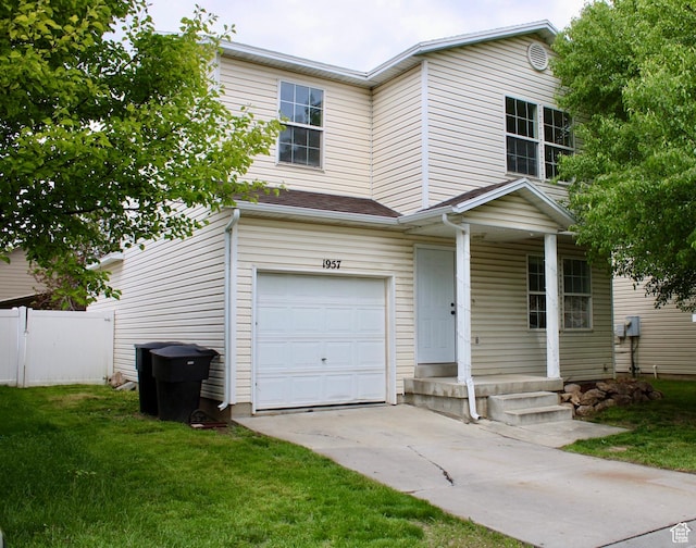 1957 N 2225 W, Clinton, UT 84015 - view of front of property featuring a garage and concrete driveway